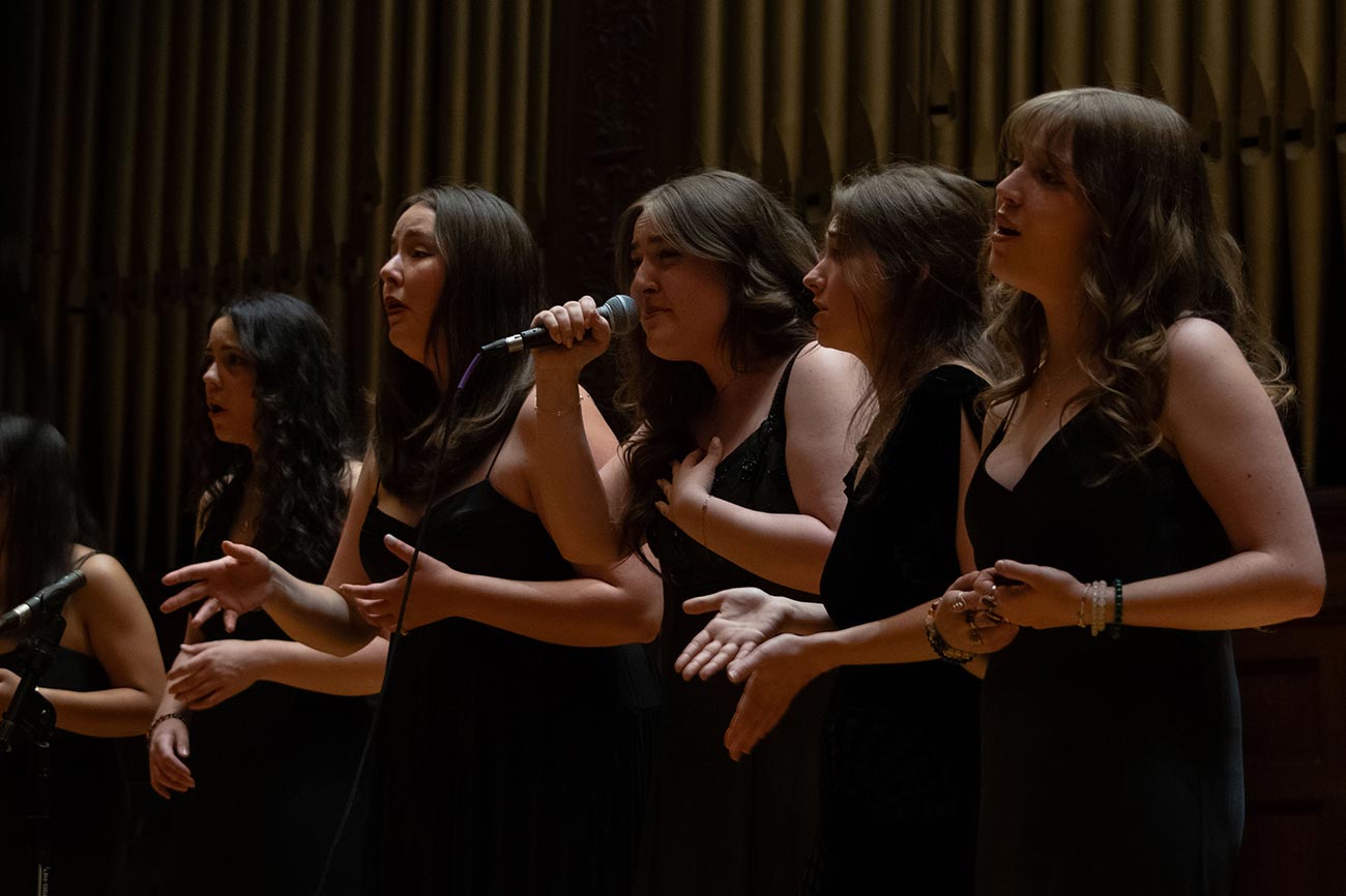 Row of Drexel Treblemakers girls singing together