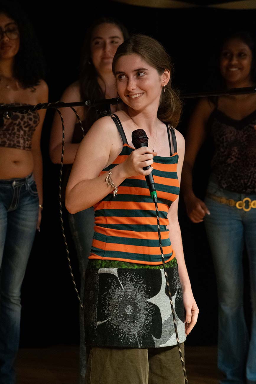 Drexel Treblemaker smiling during a pause in her senior solo performance